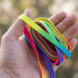 Preview: Gummitwist Kinder 6 m – Regenbogen Band Hüpfgummi Indoor & Outdoor – Spielzeug, Gartenspiele & Bewegungsspielzeug – Geschenk für Mädchen & Jungen zu Geburtstag, Weihnachten, Ostern, Einschulung